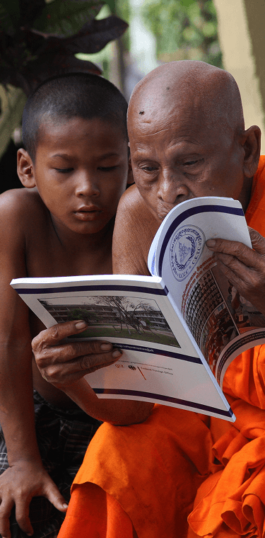 Monk reading the eccc book